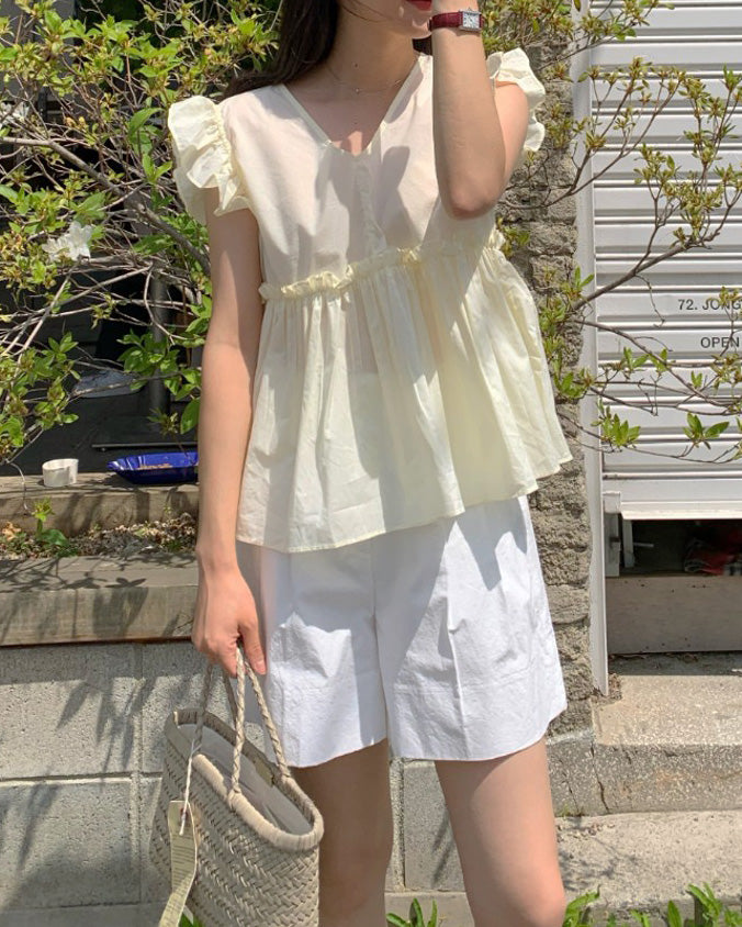 バックリボンスリーブレスブラウス